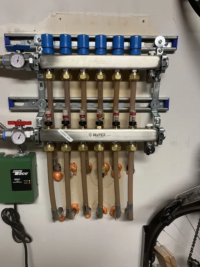 Plumber performing Gas Line Installation at a residential property in Elizabeth